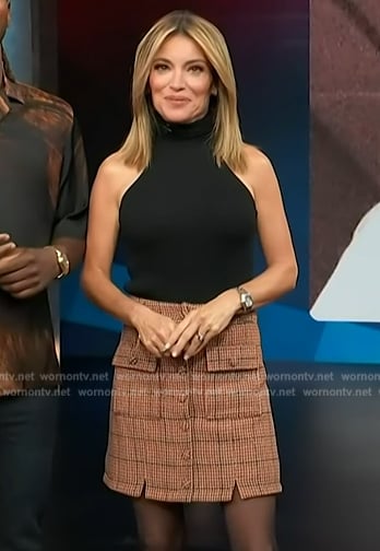 Kit’s plaid mini skirt on Access Hollywood