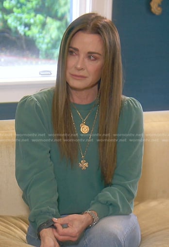 Kyle’s green puff sleeve sweatshirt and necklace on The Real Housewives of Beverly Hills