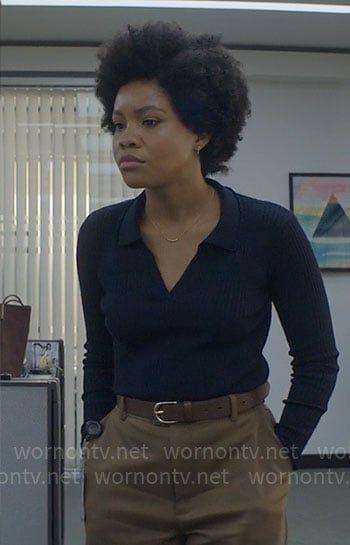 Nella’s navy rib knit polo shirt and turquoise sneakers on The Other Black Girl