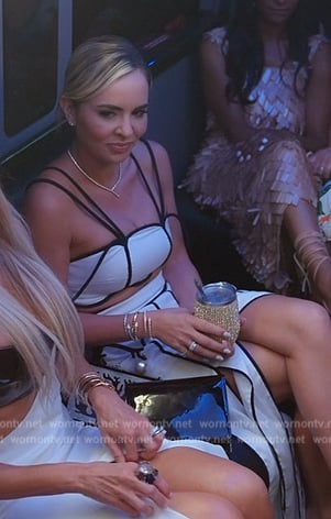 Nicole’s white piping trim top and skirt on The Real Housewives of Miami