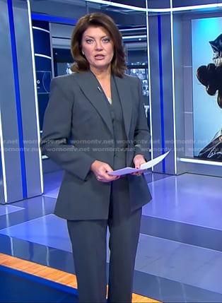Norah’s grey pant suit on CBS Evening News