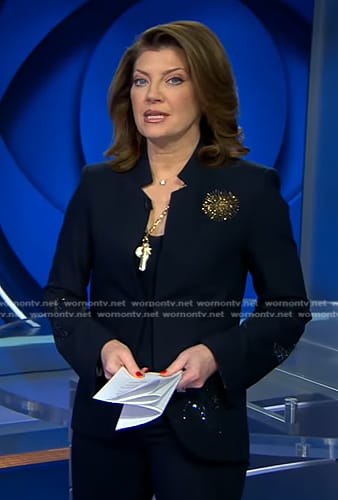 Norah’s navy embellished jacket on CBS Evening News