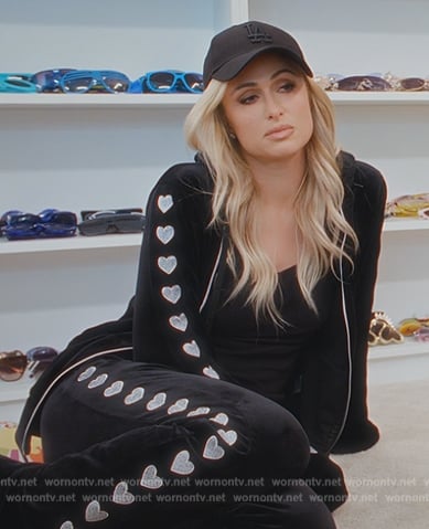 Paris’s black heart embroidered hoodie and track pants on Paris in Love