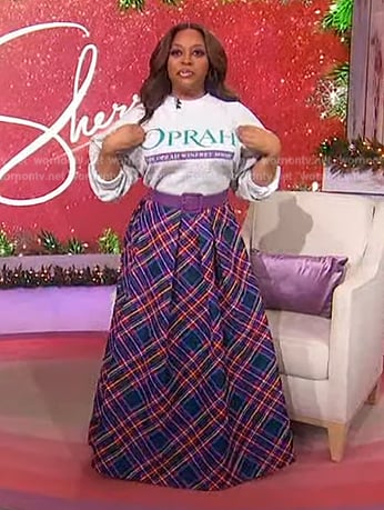 Sherri’s Oprah sweatshirt and plaid skirt on Sherri