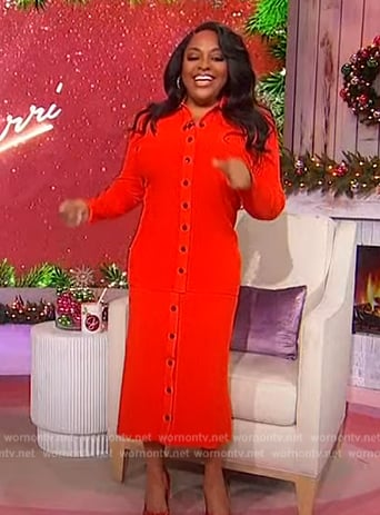 Sherri’s red ribbed sweater and skirt on Sherri