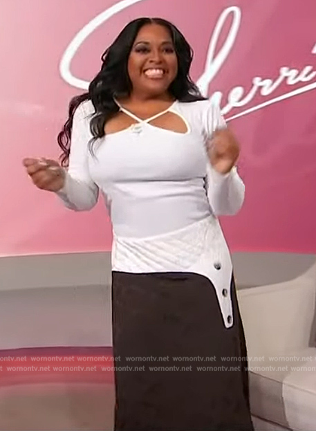 Sherri’s white cutout top and skirt on Sherri
