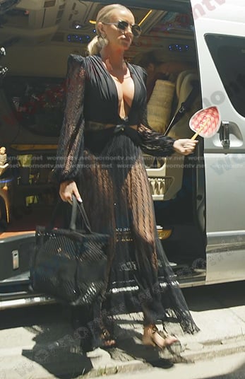 Whitney’s black cutout lace dress on The Real Housewives Ultimate Girls Trip
