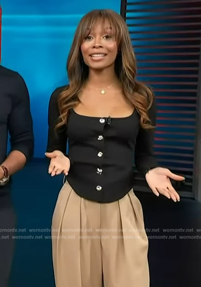 Zuri’s black button down square neck top on Access Hollywood