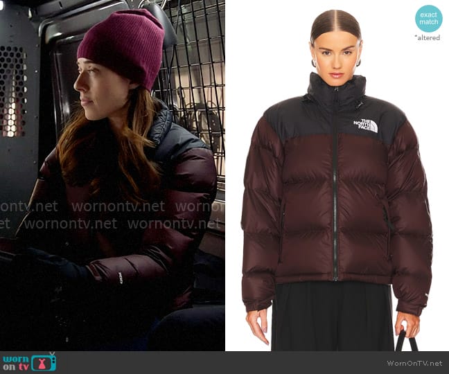 The North Face 1996 Retro Nuptse Jacket in Coal Brown Tnf Black worn by Kim Burgess (Marina Squerciati) on Chicago PD