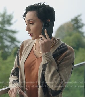 Anna’s beige argyle check cardigan on Death and Other Details