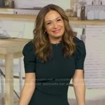 Anna Gass’s dark green puff sleeve dress on Good Morning America