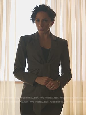 Anna’s black striped tie waist blazer on Death and Other Details