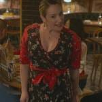 Davia’s black floral print wrap dress on Good Trouble