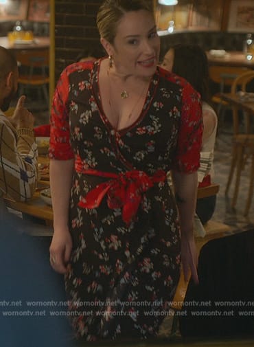Davia’s black floral print wrap dress on Good Trouble
