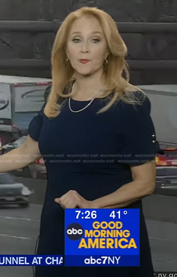 Debbie DuHaime’s navy ruffle short sleeve dress on Good Morning America
