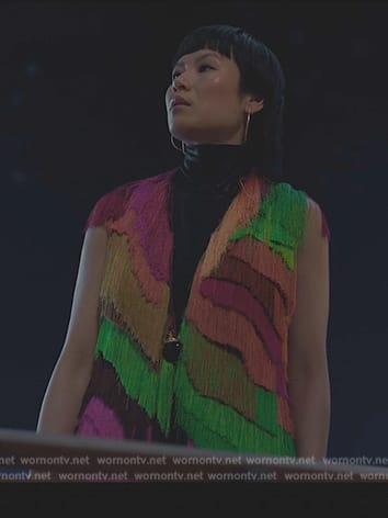 Eleanor’s colorful fringed vest on Death and Other Details