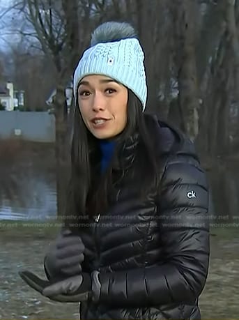 Emilie’s black quilted jacket and blue beanie on Today