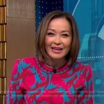 Eva’s pink and blue short sleeve sweater on Good Morning America