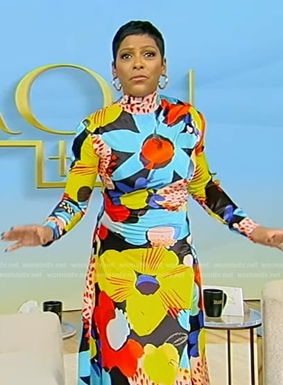 Tamron’s multicolored floral print dress on Tamron Hall Show