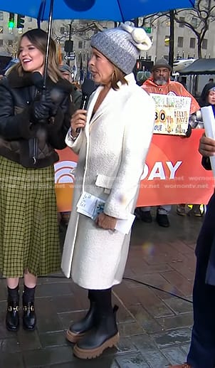 Hoda’s white coat and chunky boots on Today