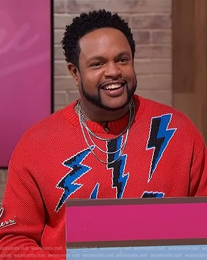 Jawn’s red lightning bolt sweater on Sherri