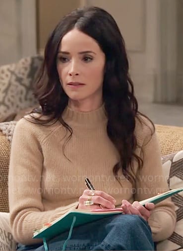 Julia’s beige sweater on Extended Family