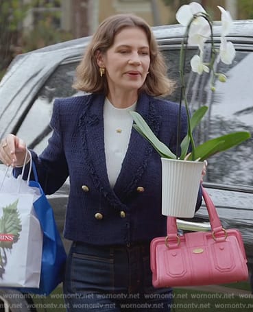 Julie’s blue tweed jacket on The Real Housewives of Miami