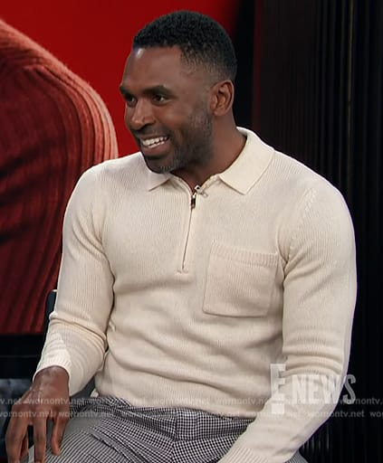Justin’s white knit polo sweater on E! News