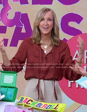Lara’s brown tie neck blouse on Good Morning America