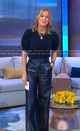 Lara’s navy puff sleeve top and belted leather pants on Good Morning America
