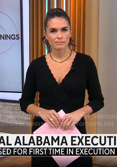 Lilia Luciano’s black scallop trim dress on CBS Mornings