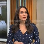 Lilia Luciano’s navy polka dot wrap dress on CBS Mornings
