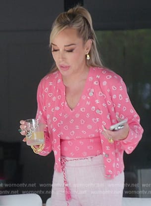Marysol’s pink logo vest and cardigan on The Real Housewives of Miami