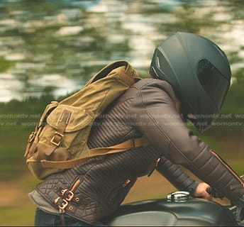 Maya’s green leather detail backpack on Echo