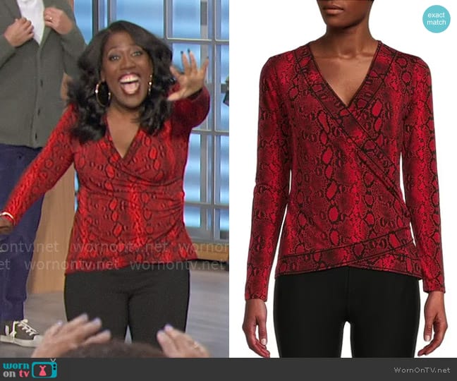 MICHAEL Michael Kors Animal Print Matte Jersey V-Neck Long Sleeve Wrap Top worn by Sheryl Underwood on The Talk