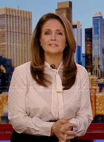 Michelle Charlesworth’s ivory tie neck blouse on Good Morning America