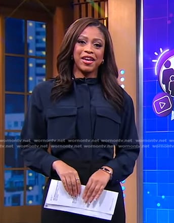 Morgan Norwood’s navy patch pocket top on Good Morning America