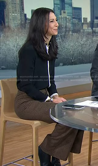 Natalie’s black contrast trim shirt and plaid pants on Today