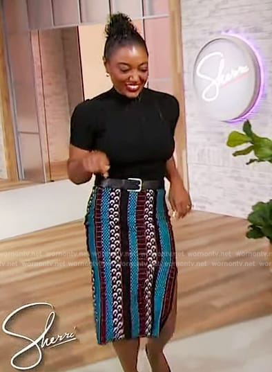 Patina Miller’s black knit top and printed skirt on Sherri