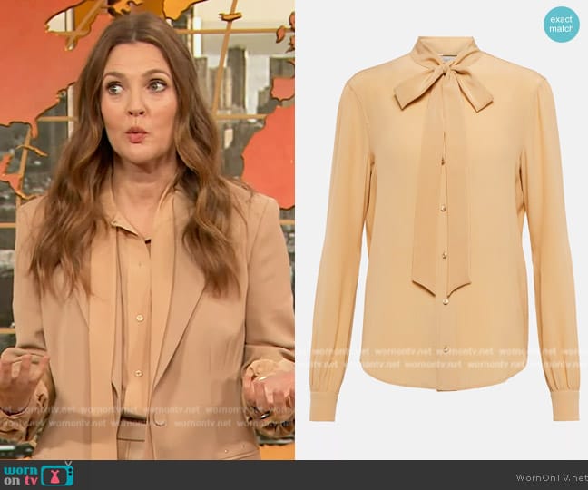 Saint Laurent Tie-neck silk shirt worn by Drew Barrymore on The Drew Barrymore Show
