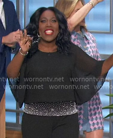 Sheryl’s black embellished waistband top on The Talk