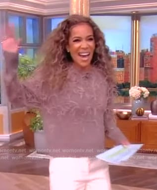 Sunny’s beige feather trim sweater on The View