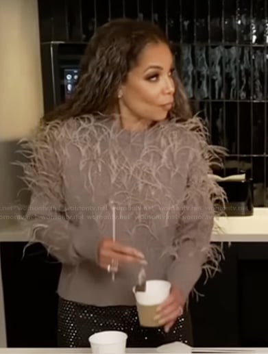 Sunny’s beige feather trim sweater on The View