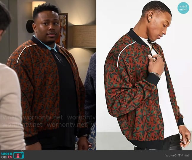 ASOS Design Oversized jersey track jacket in patterned jacquard with piping worn by Marty (Marcel Spears) on The Neighborhood