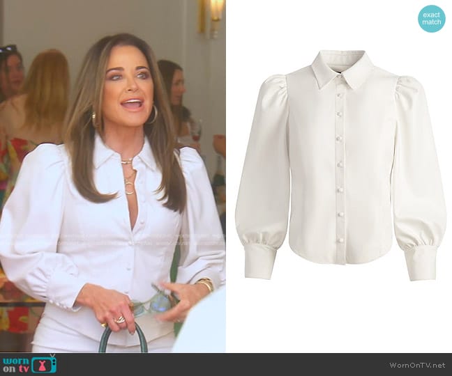 Alice + Olivia Nadine Puff-Sleeve Vegan Leather Blouse worn by Kyle Richards on The Real Housewives of Beverly Hills
