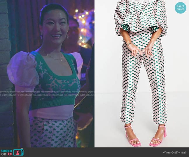 Glamorous High Waisted Straight Leg Pants in pink heart jacquard worn by Sumi (Kara Wang) on Good Trouble