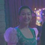 Sumi’s green cropped vest and puff sleeve top on Good Trouble