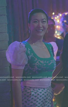 Sumi’s green cropped vest and puff sleeve top on Good Trouble