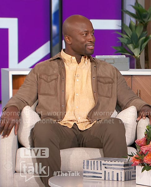 Akbar’s taupe suede jacket on The Talk
