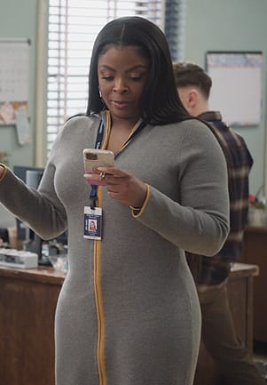 Ava’s gray zip front dress on Abbott Elementary